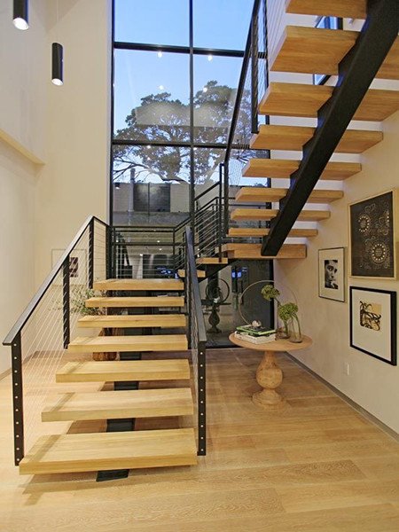 U shaped staircase with oak